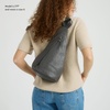 image:imageThe Sak Geo Sling Backpack in Crochet Single Sling Shoulder Strap BlackSlate